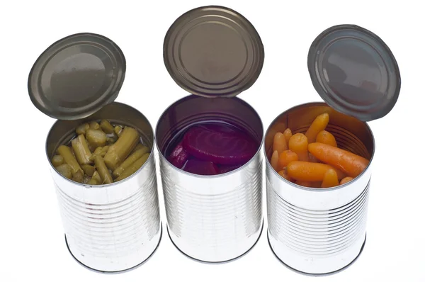 Variedade de vegetais enlatados em latas — Fotografia de Stock
