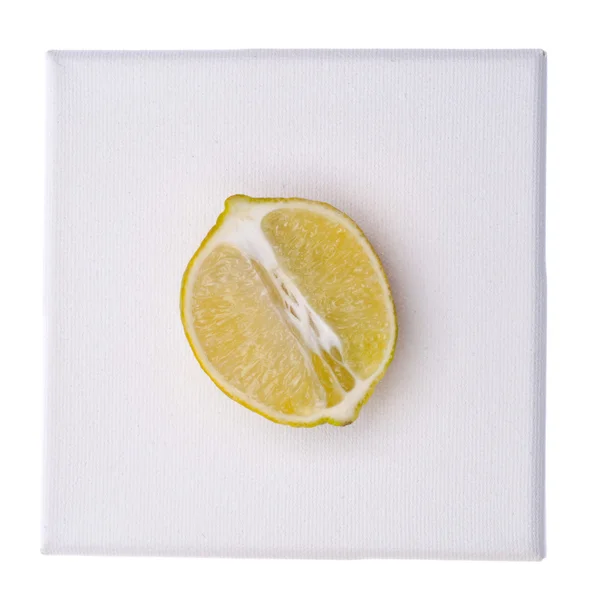 Kunst Voedsel Concept Lime Helft Canvas Geïsoleerd Wit Met Een — Stockfoto
