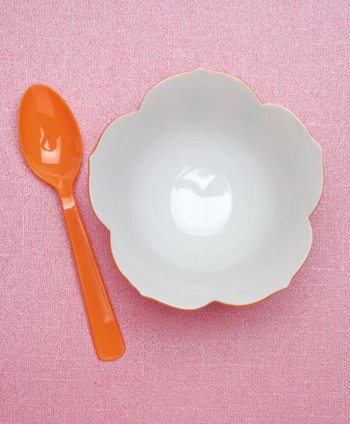 Orange bowl ve kaşık — Stok fotoğraf