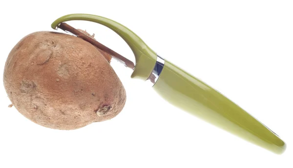 Dulce patata siendo pelado —  Fotos de Stock