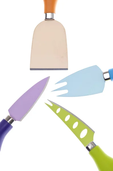 Σύνολο τέσσερα δονούμενα χρωματιστό μαχαίρια και πιρούνι. — Φωτογραφία Αρχείου