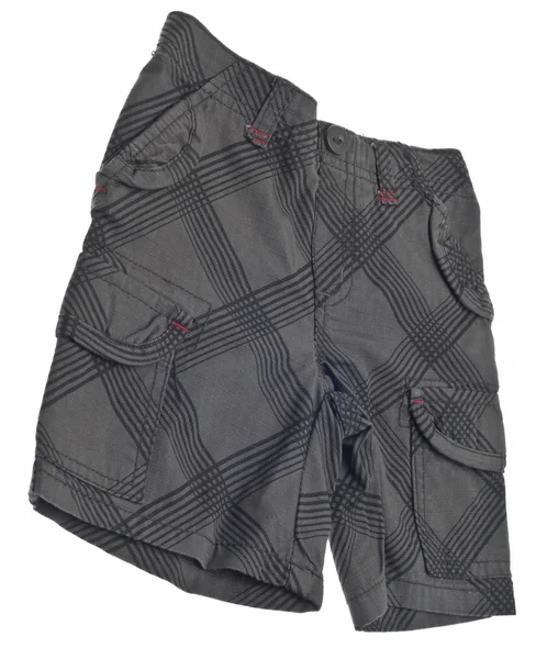 Pantalones cortos para hombre o niño aislados en blanco con un camino de recorte . — Foto de Stock