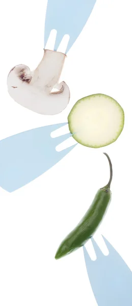 Färska grönsaker på gafflar — Stockfoto