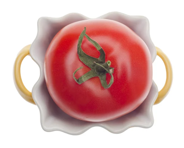 Tomate in einem gelben Kochtopf — Stockfoto