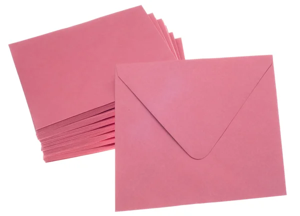 Stapel enveloppen roze uitnodiging — Stockfoto