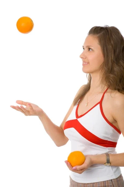 Mulher com laranjas — Fotografia de Stock