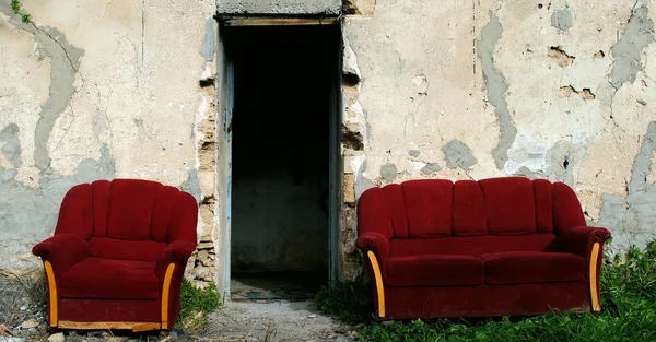 Red_armchair_and_sofa — Zdjęcie stockowe
