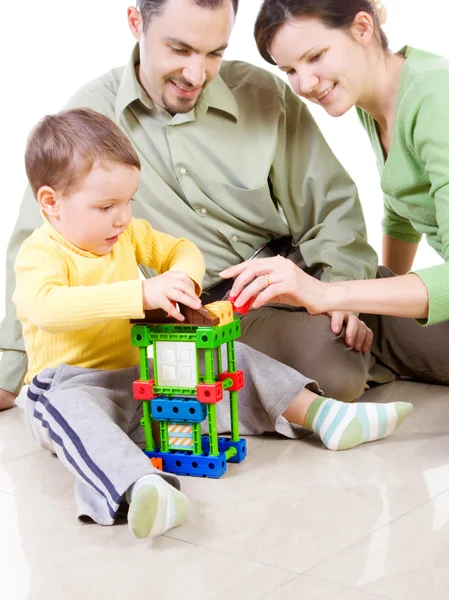 Child is building a house with patents — Stock Photo, Image