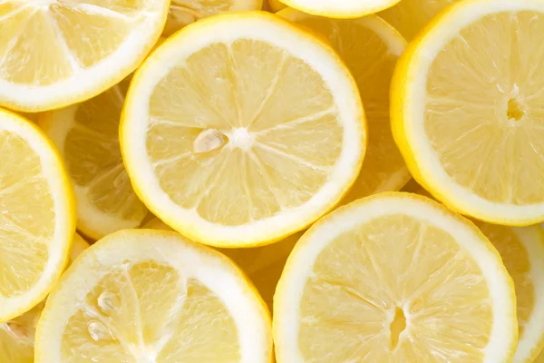 stock image Background with cut lemons