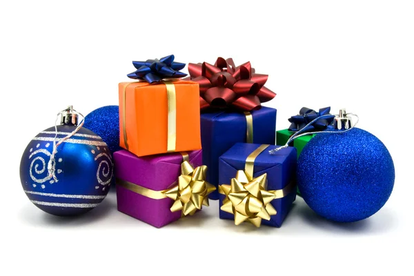Blue christmas baubles and gifts — Stock Photo, Image