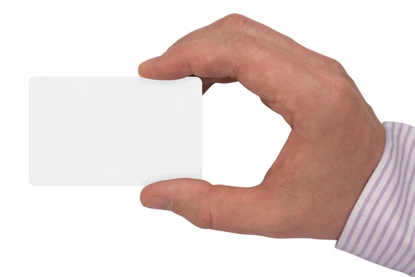 Рука с белым пустая карта — стоковое фото