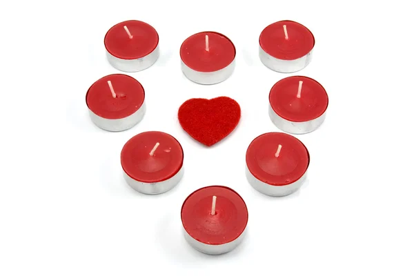 Tvaru srdce vyrobený z červené svíčky — Stock fotografie