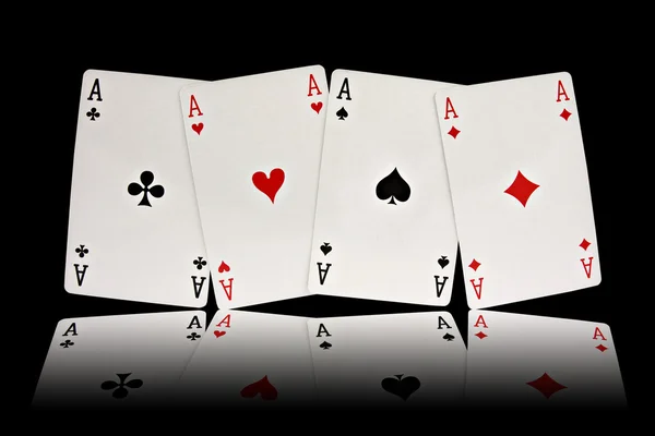 Quatro ases jogando cartas ternos — Fotografia de Stock