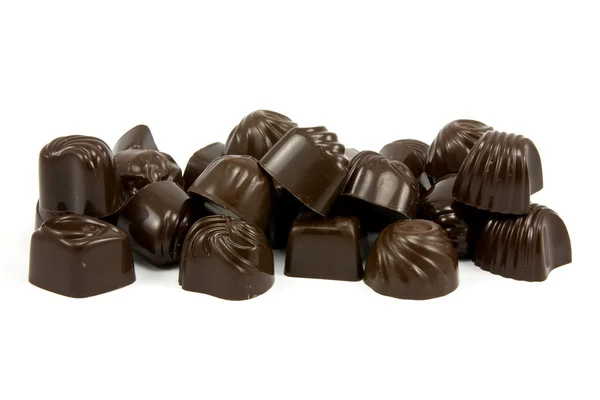 Leckere Pralinen aus dunkler Schokolade — Stockfoto