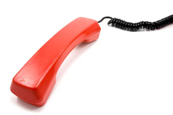 赤い古い白い背景の上の電話の受話器の傷 — ストック写真