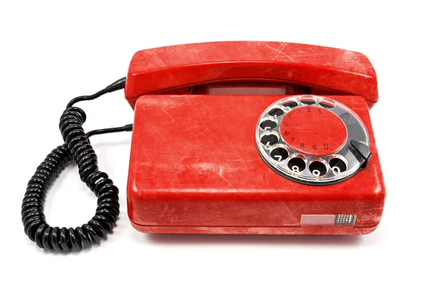Oude vuile rode telefoon — Stockfoto