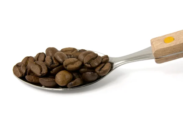 Sendok dengan biji kopi — Stok Foto