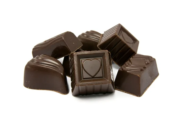 Dark Assorted Chocolate Pralines White Background – stockfoto