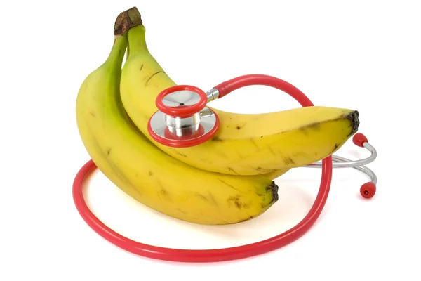 Bananen und Stethoskop — Stockfoto