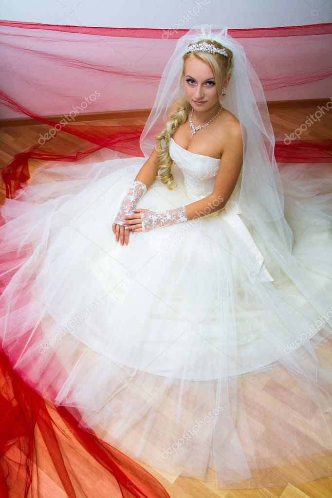 Bride sitting on the floor