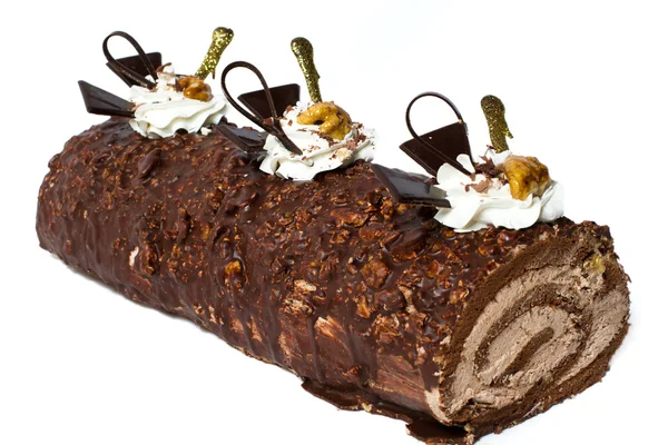 Chocolade roll met noten. — Stockfoto