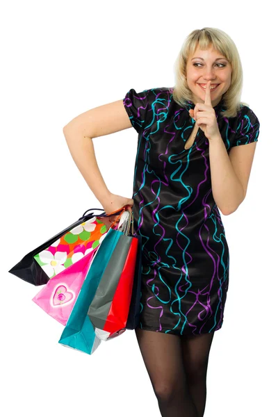 Menina bonita com pacotes coloridos . — Fotografia de Stock