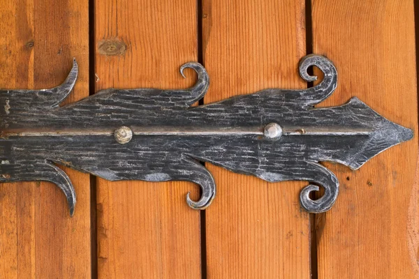 Antique door hinge. Stock Picture