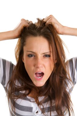 Woman pulls her hair in frustration. clipart