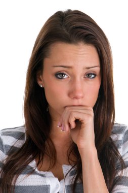 Woman puts her hand to her mouth with a worried and upset look on her face. clipart