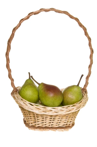 Ripe pears in handmade basket — Stock Photo, Image