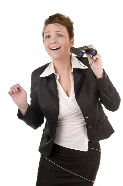 Excited business woman with binoculars — Stock Photo, Image