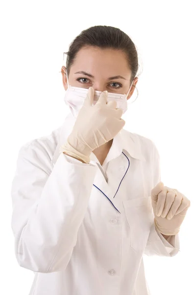 Médico en máscara protectora y guantes —  Fotos de Stock