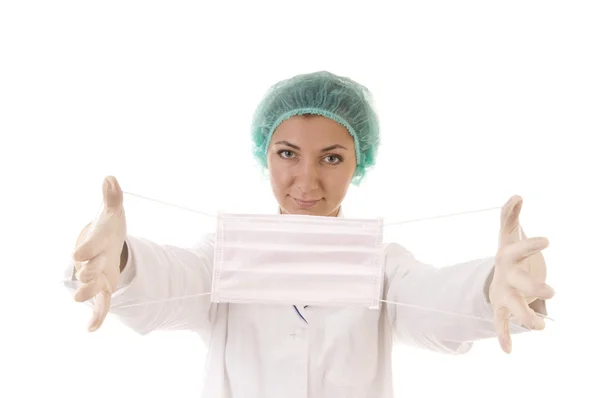 Máscara protetora na mão do médico — Fotografia de Stock