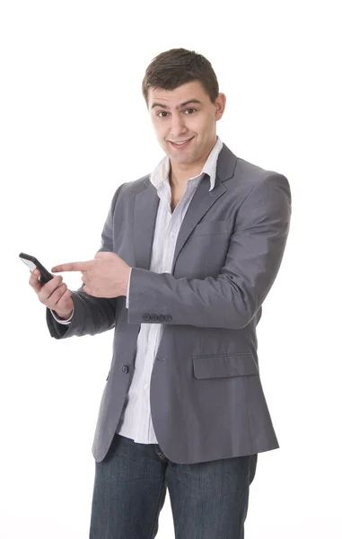 Ung, tilfeldig ung mann med telefon – stockfoto