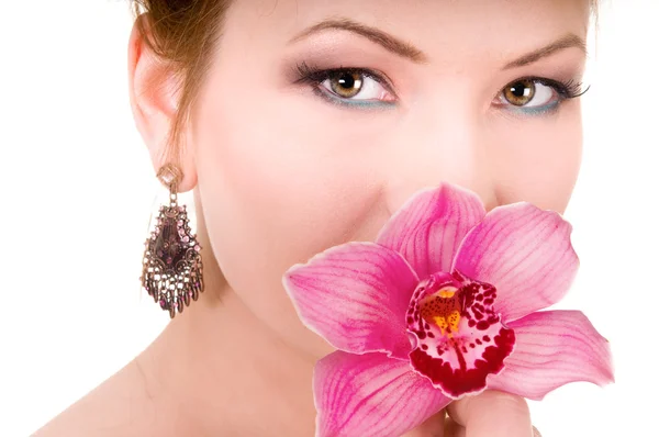 Orquídea rosa e mulher de beleza — Fotografia de Stock