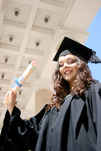 Ung leende kaukasiska student i klänning — Stockfoto