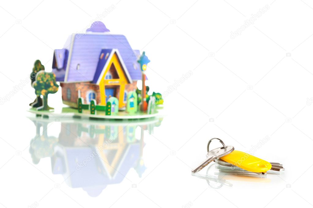 House with keys isolated on white
