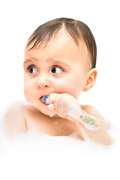 I primi passi per lavarsi i denti non sono facili. . — Foto Stock