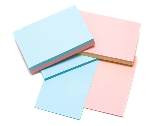 Farbige Notizbuchseiten auf weiß — Stockfoto