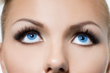 Close-up of beautiful womanish eyes clipart