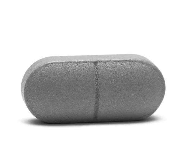 Pilulka izolované na bílém pozadí — Stock fotografie