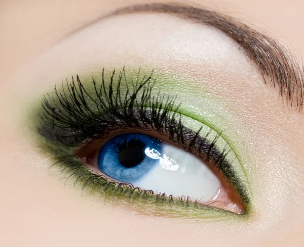 Крупный план красивого женского глаза Стоковое Фото