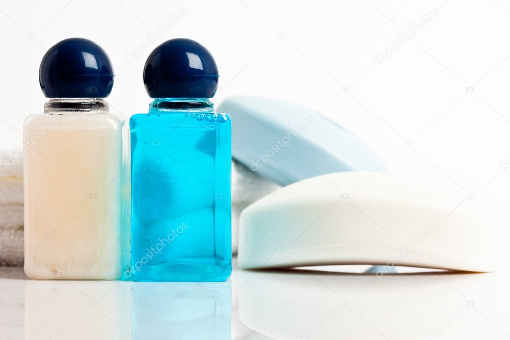 Bottles with shampoo and soap