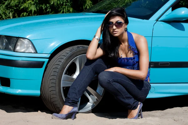 Beautiful woman in a car — Stock Photo, Image