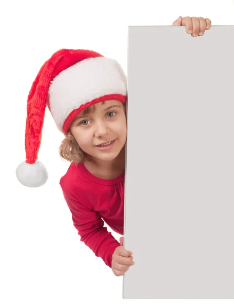 Girl in christmas hat with empty blank — Stock Photo, Image