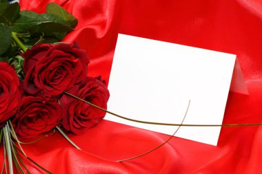 Red roses and invitation card clipart