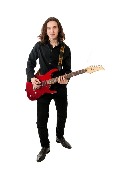 Jovem Guitarrista Com Guitarra Vermelha Sobre Fundo Branco — Fotografia de Stock