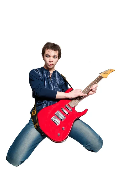 年轻的吉他手在白色背景上的电吉他 — 图库照片
