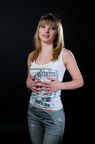 Blond girl in shirt and jeans — Stock Photo, Image