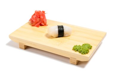 Sushi on wooden stand clipart